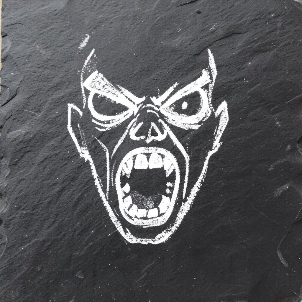 A bold exclamation mark drawn in chalk on a dark slate board, conveying urgency and emphasis.